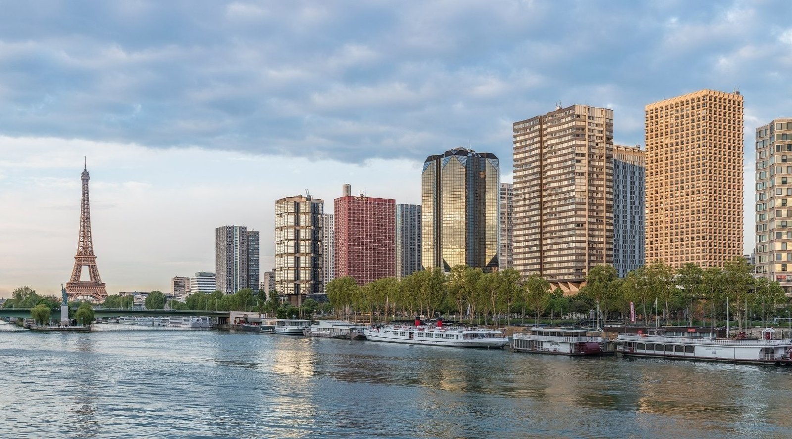 Panorama of modern Paris, with contemporary towers rising beyond the historic skyline